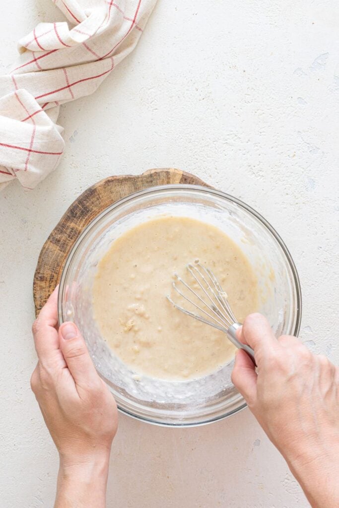 Whisking pancake batter until smooth