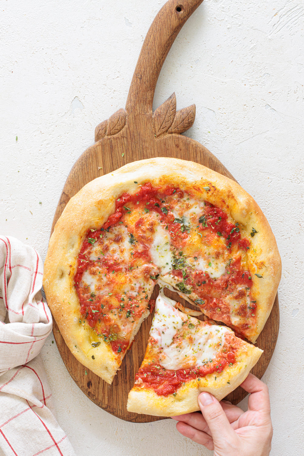 Grabing a slice of Pizza Margherita