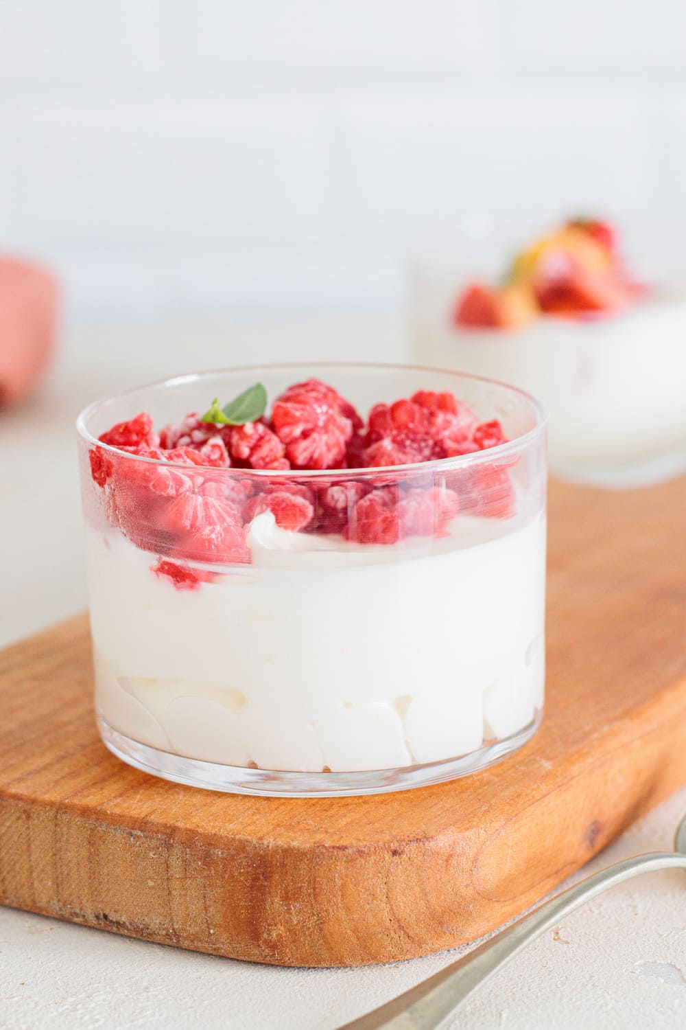 Keto cheesecake topped with raspberries