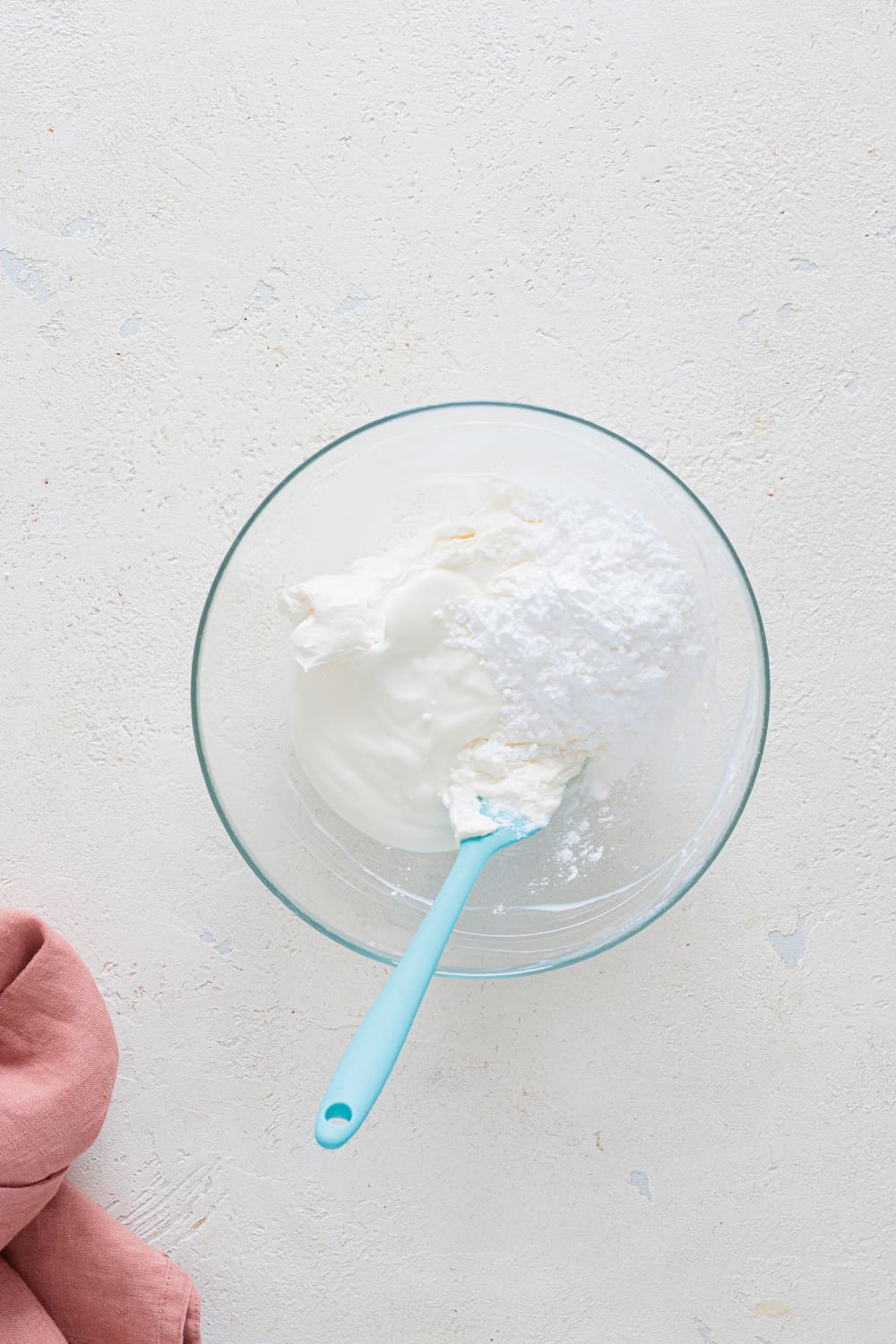 Add yogurt and powdered erythritol to the bowl