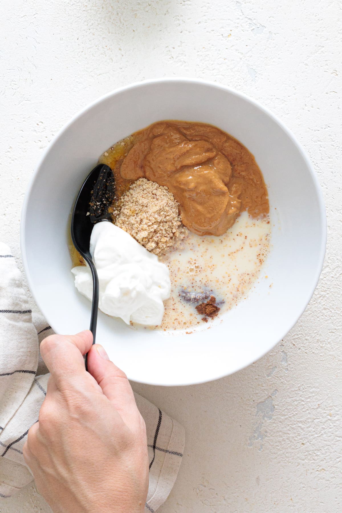Stirring until smooth and combined.