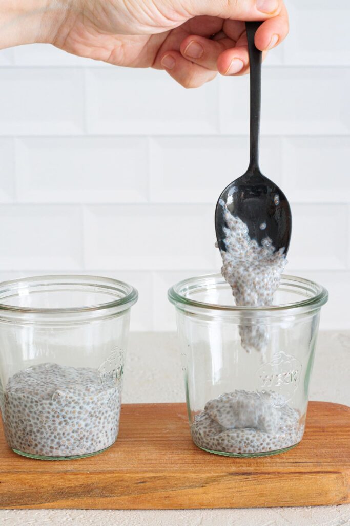 Spoon chia pudding into serving jars.