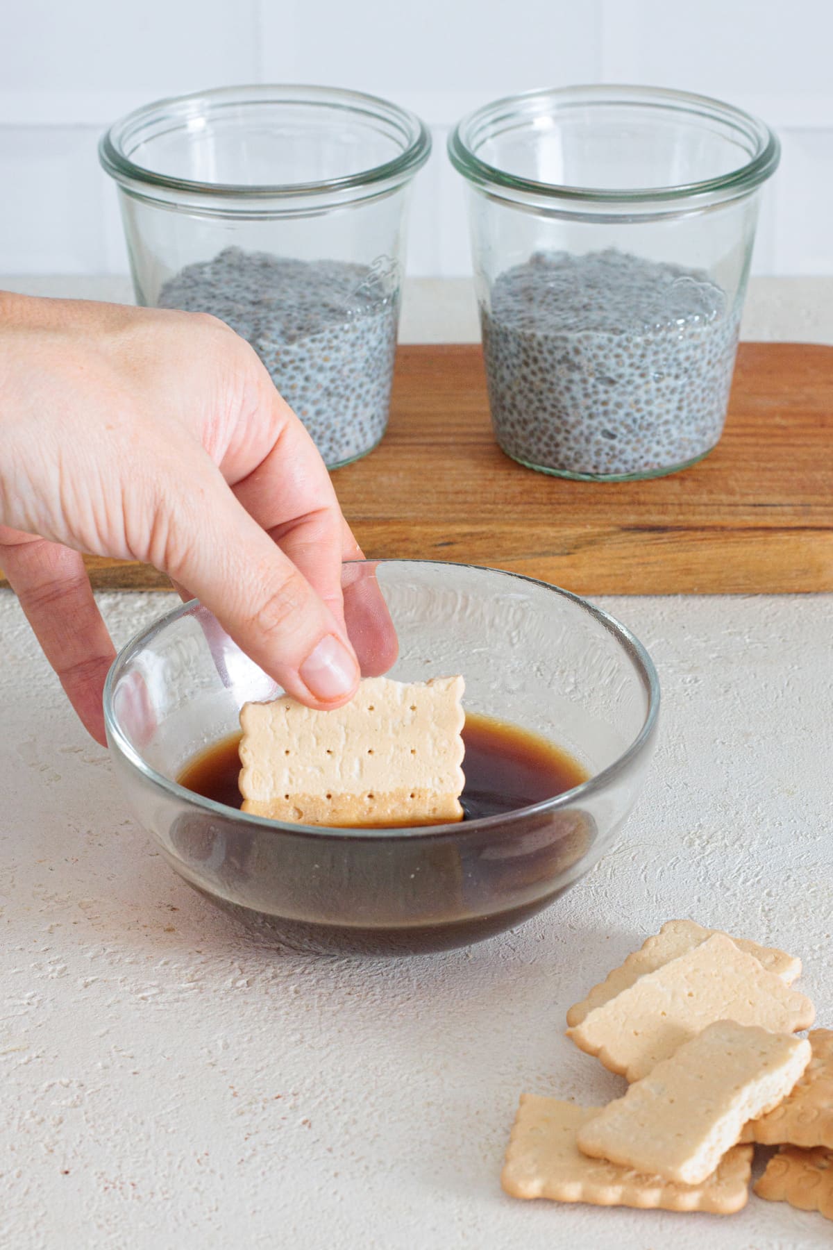 Dip biscuits into cold espresso.