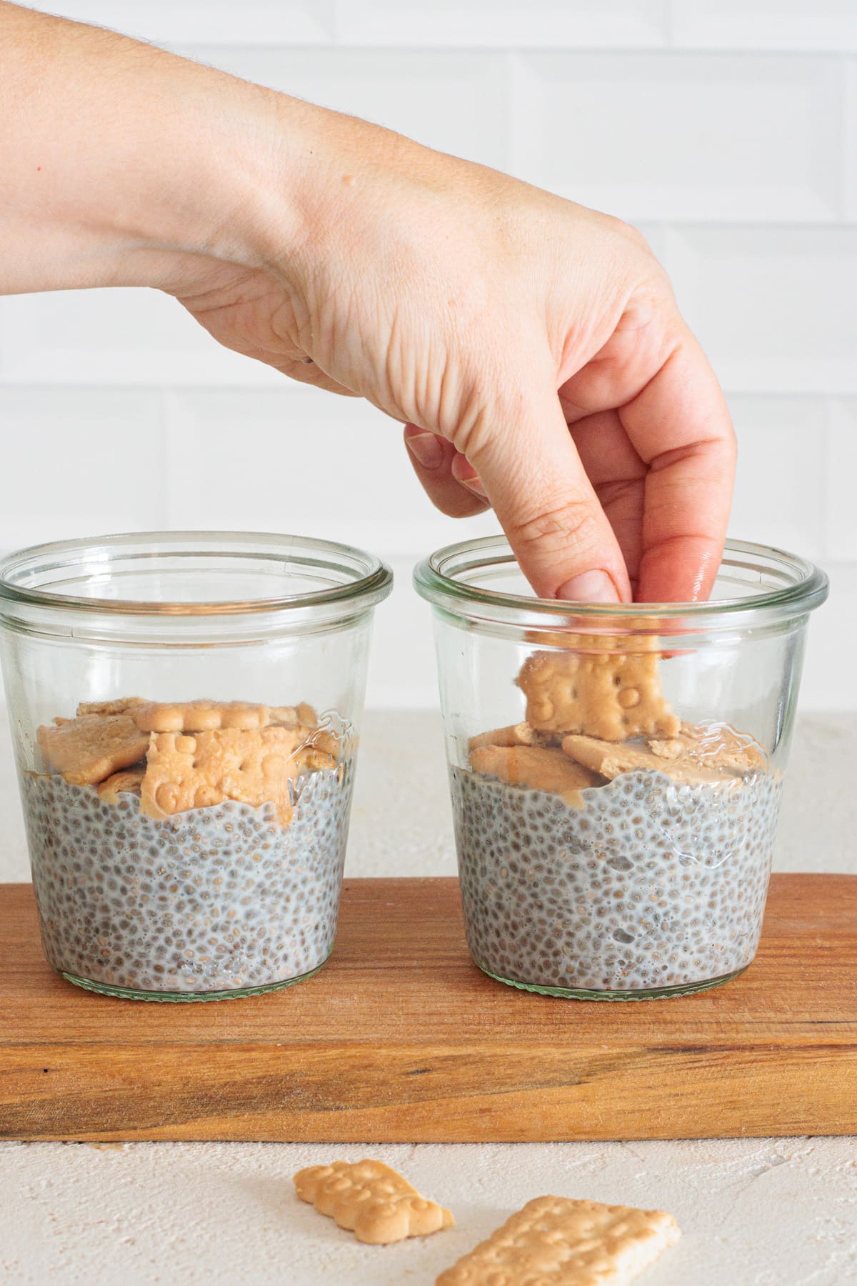 Layer soaked biscuits over chia pudding.