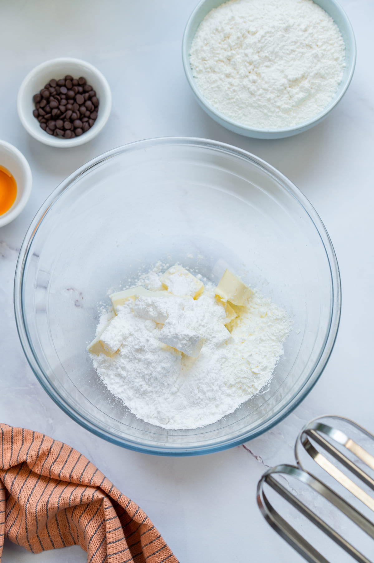 Add butter and powdered sugar in a bowl.