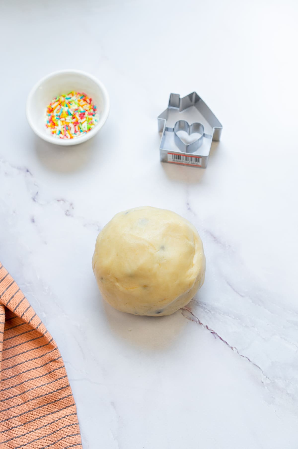 Form the dough into a smooth ball.