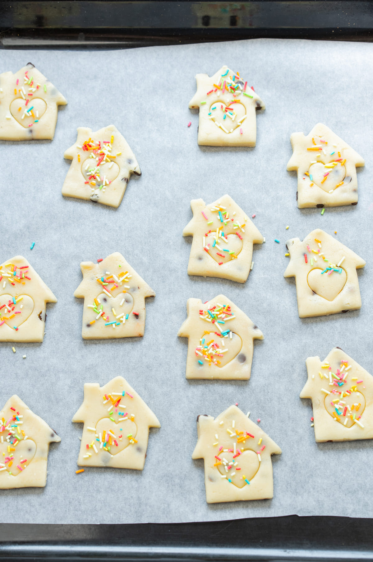 Place cookies on a tray and decorate with sprinkles.