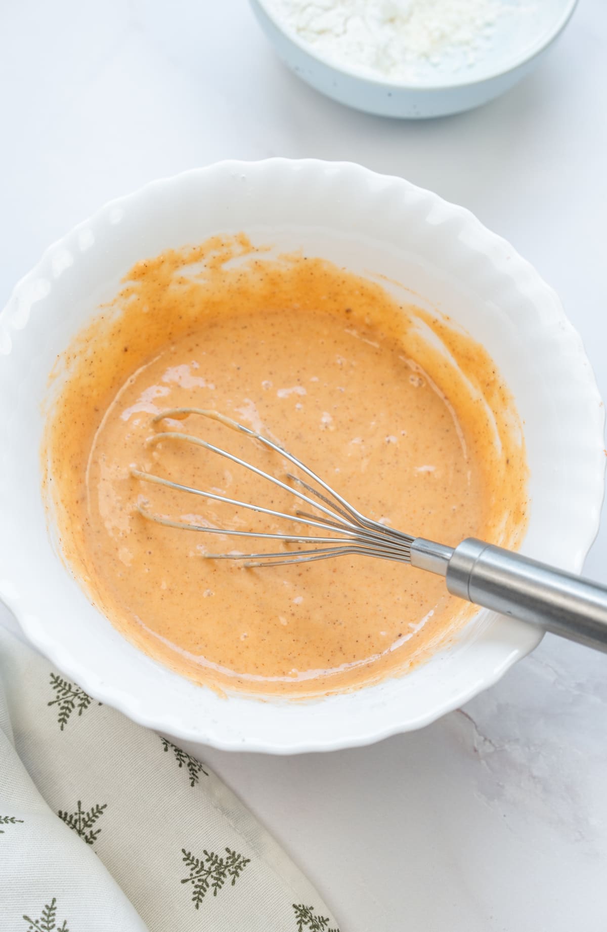 Whisk until the batter is smooth and slightly thick.