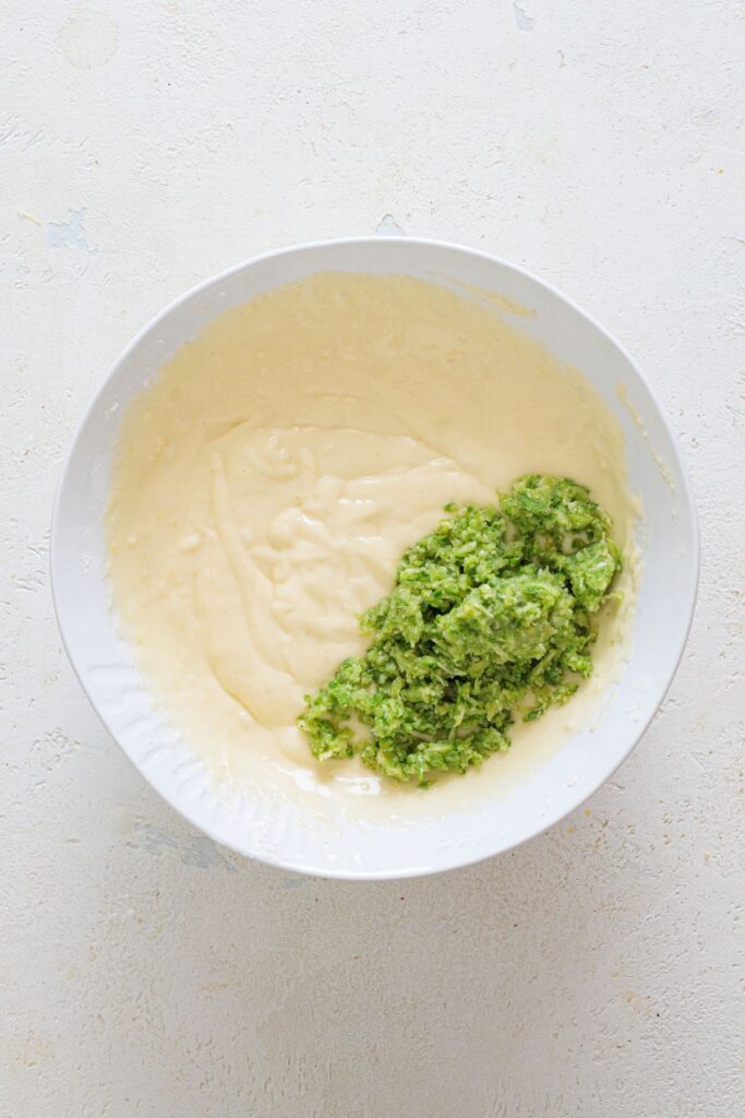Grated zucchini folded into cake batter