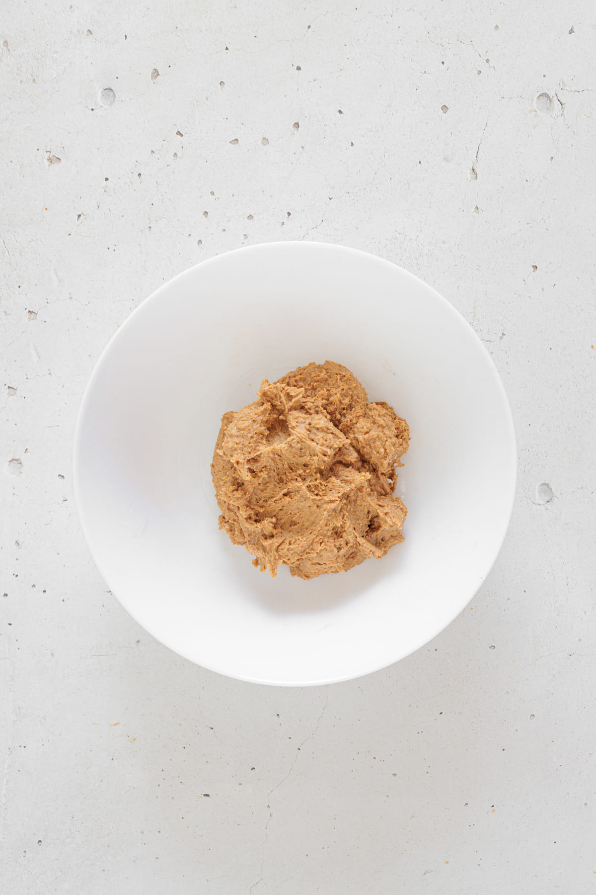 Bowl with smooth gingerbread truffle dough after blending.