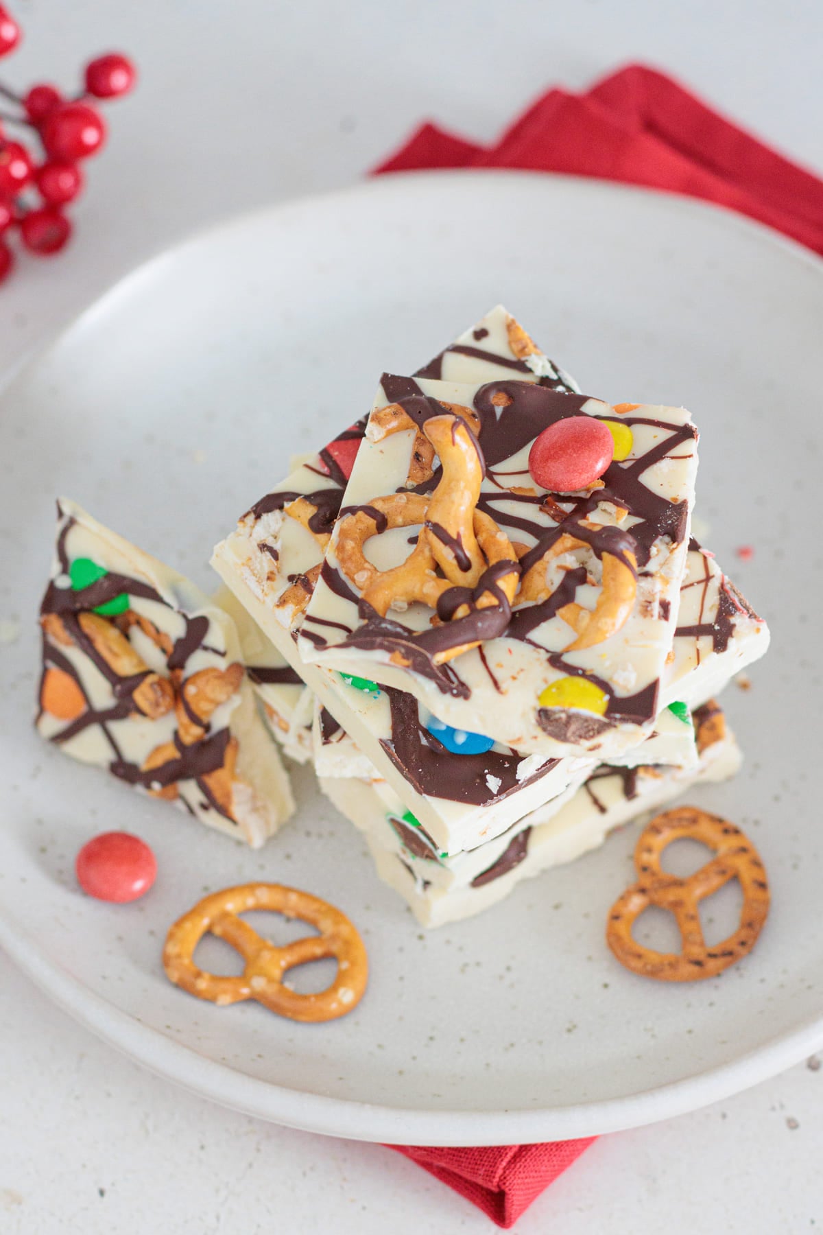 White Chocolate Pretzel Bark served with pretzels and M&M’s on top.