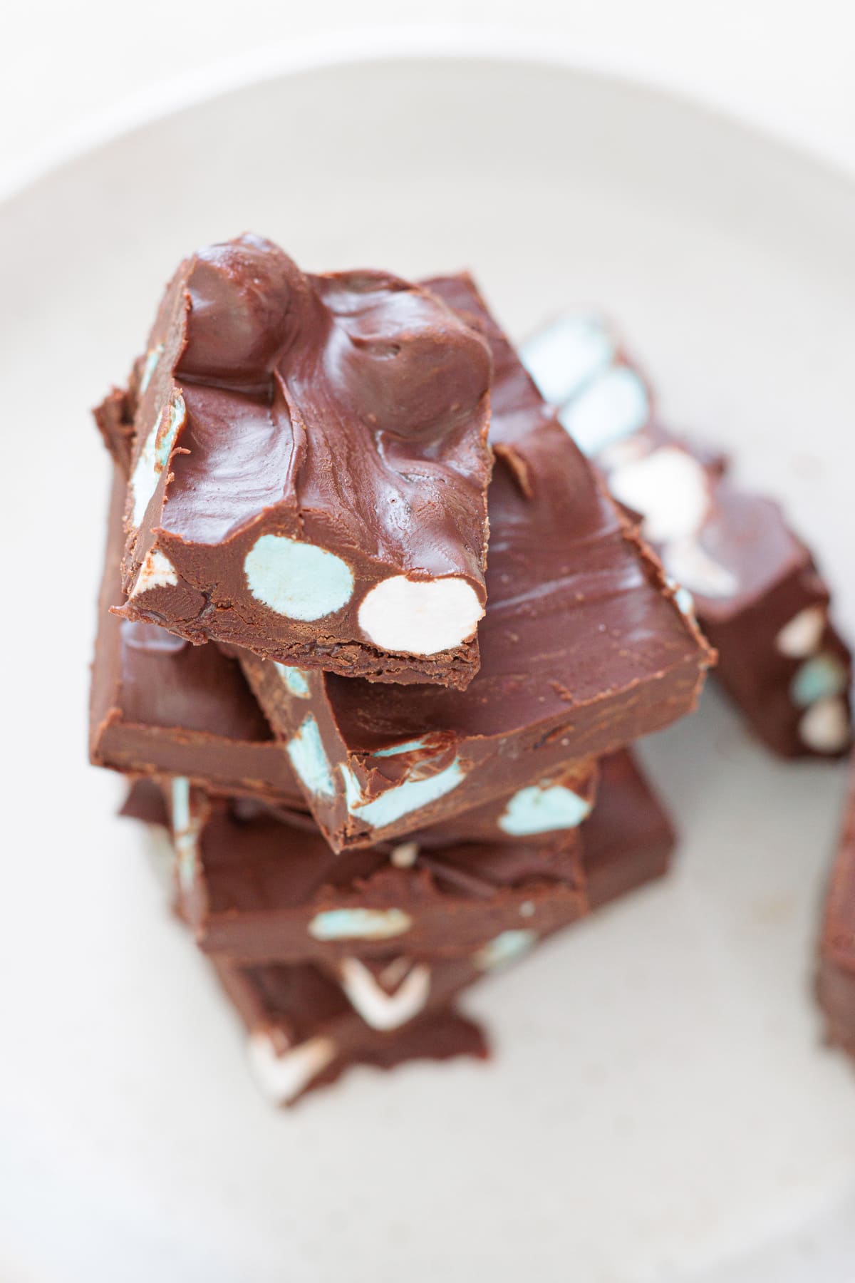 A close-up of sliced 5 Minute Fantasy Bars with their creamy chocolate texture.