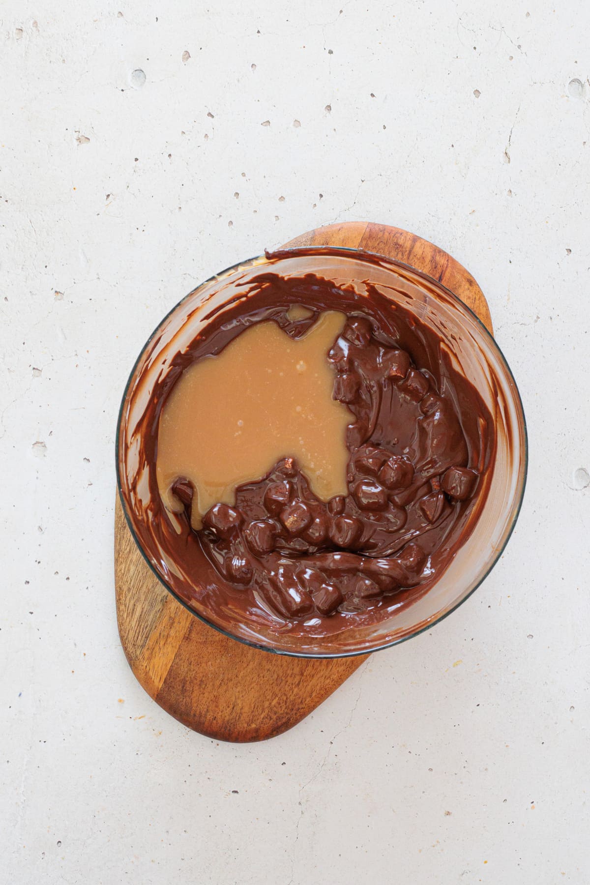 Pour the caramel sauce into the chocolate mixture.