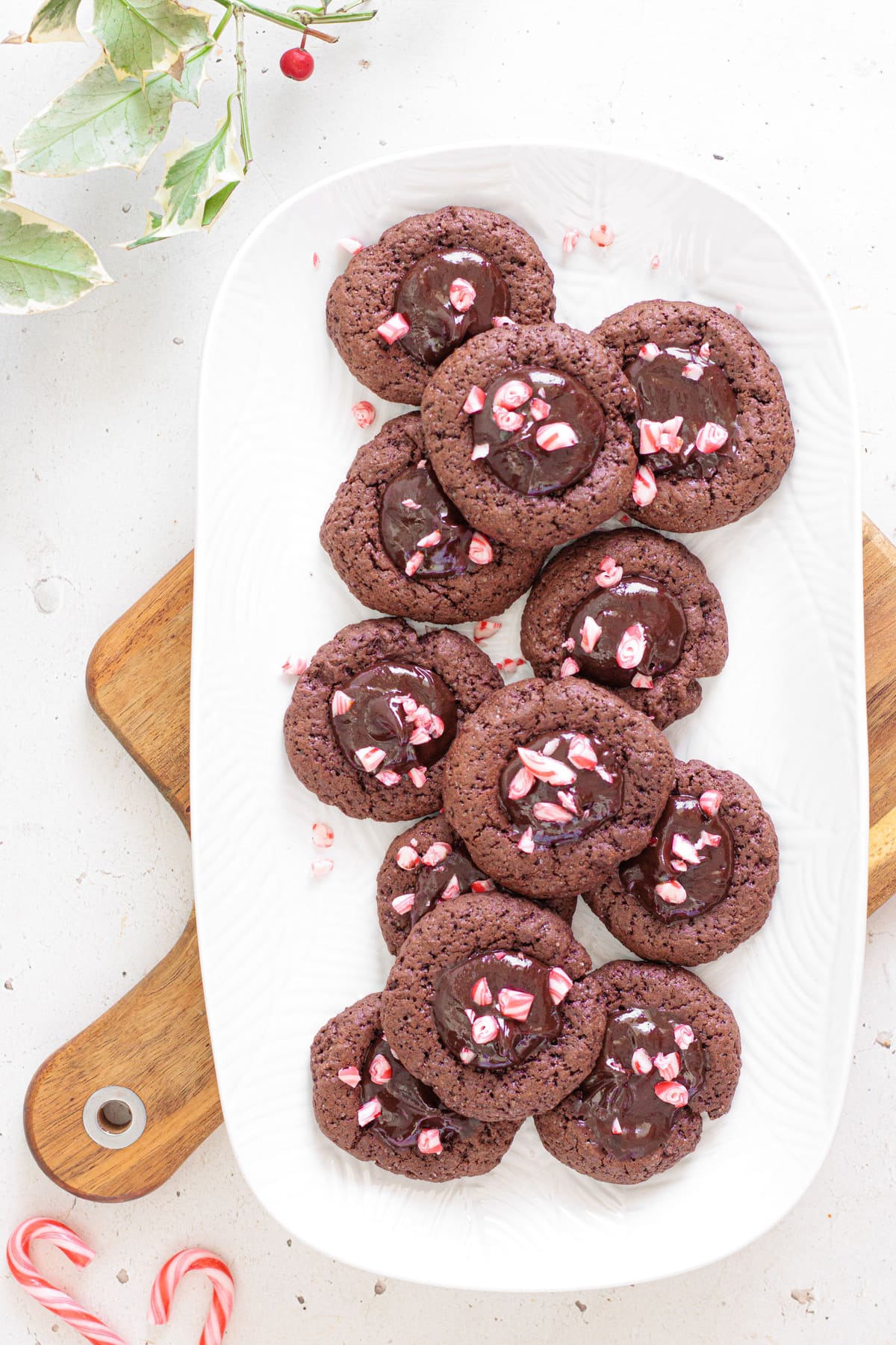 Chocolate thumbprint cookies decorated with festive peppermint candy.