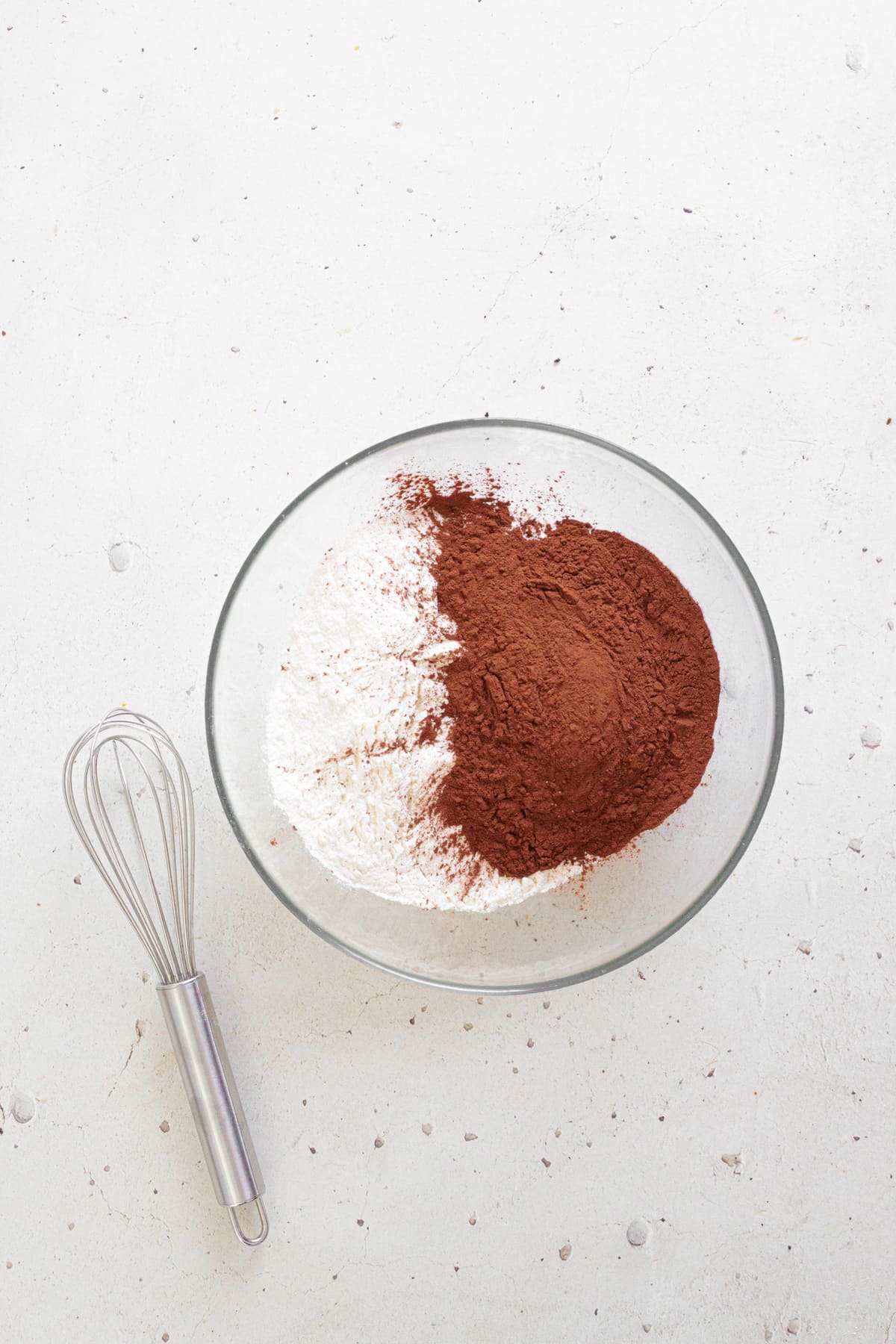 Add the flour, cocoa powder, and baking powder to a bowl.
