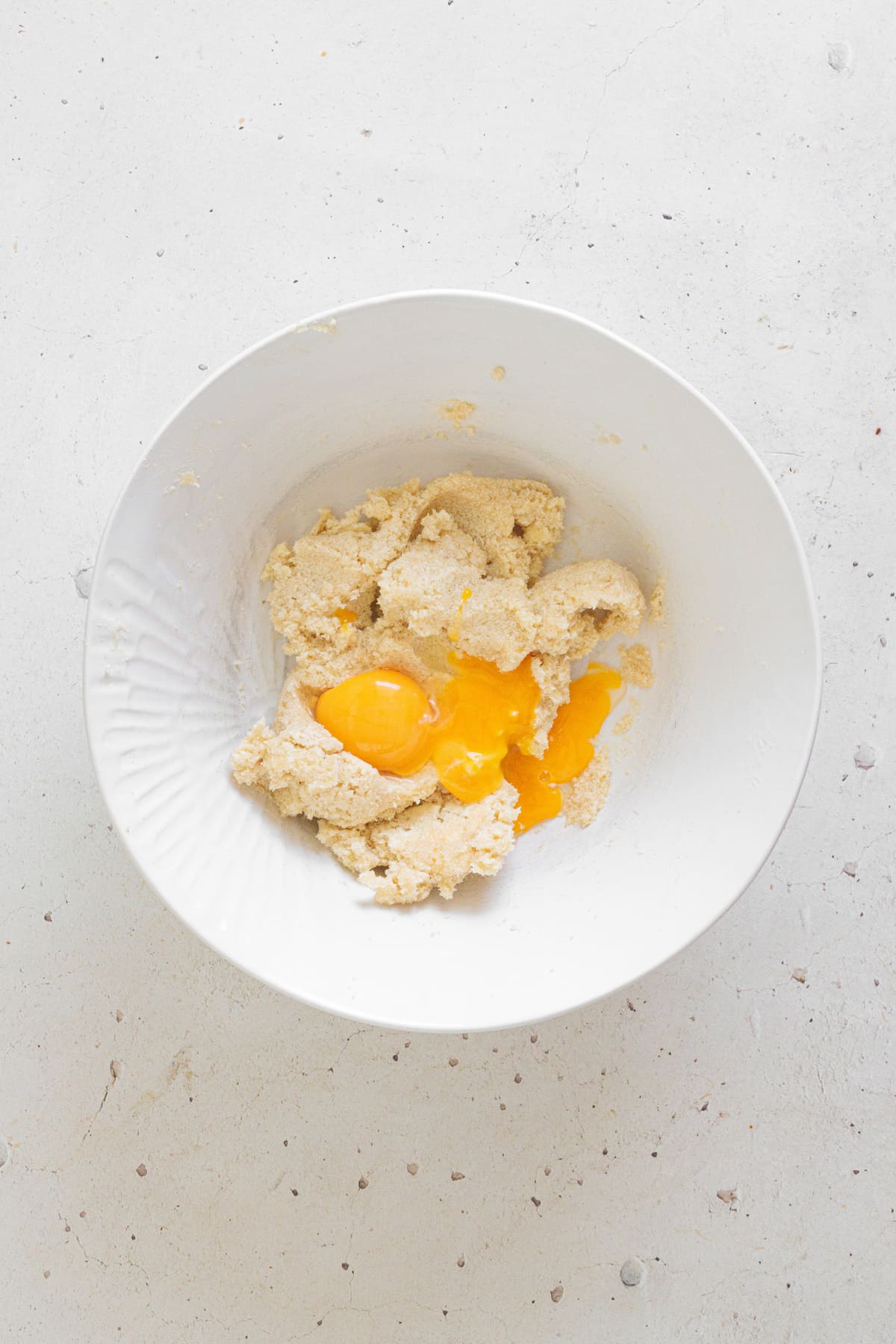 Mix in the egg yolks until the dough turns soft and uniform.