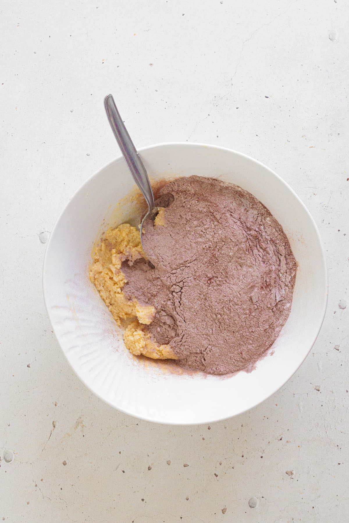 Add the dry ingredients into the butter mixture.