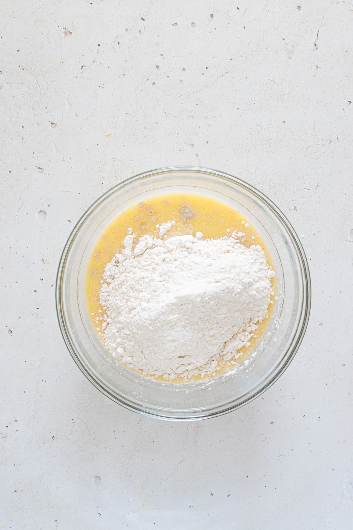Add flour gradually and mix until a soft dough forms.