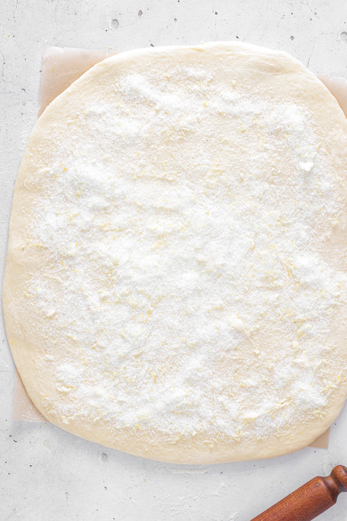Sprinkle the lemon sugar evenly over the dough