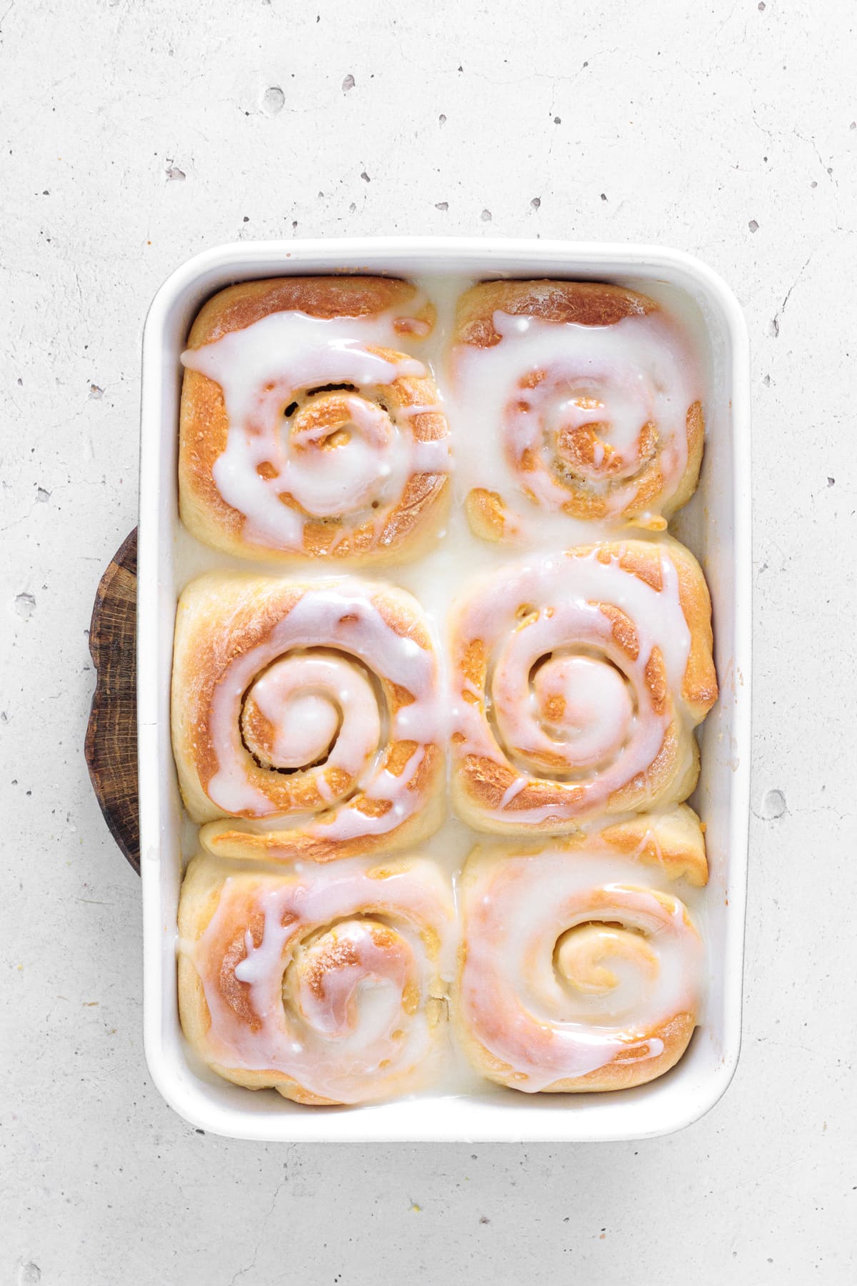 Bake until golden, then drizzle with lemon cream cheese glaze.
