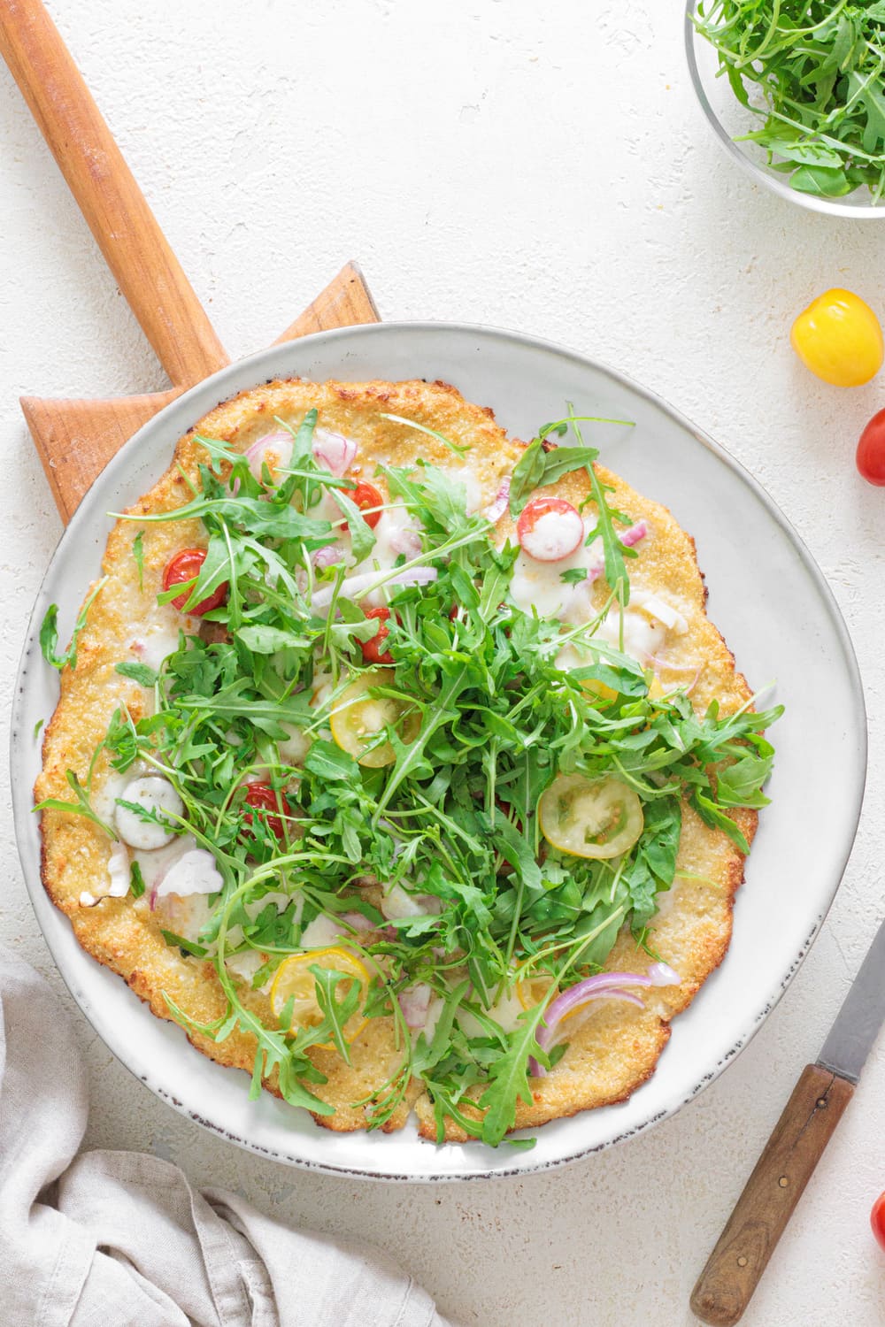 Add a handful of fresh arugula and serve.