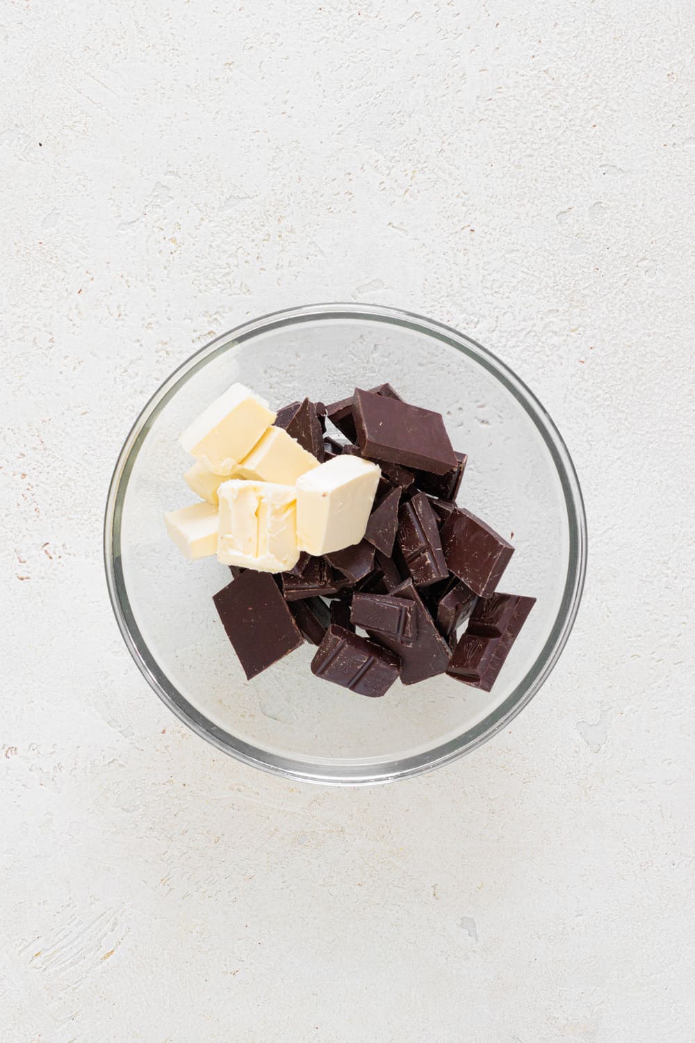 Melt the chopped dark chocolate and butter in the microwave in 30-second intervals.