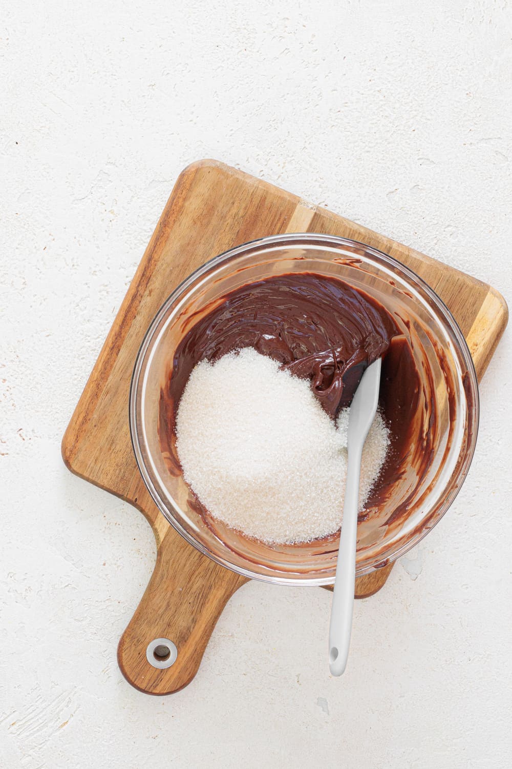 Add sugar and mix until well combined.