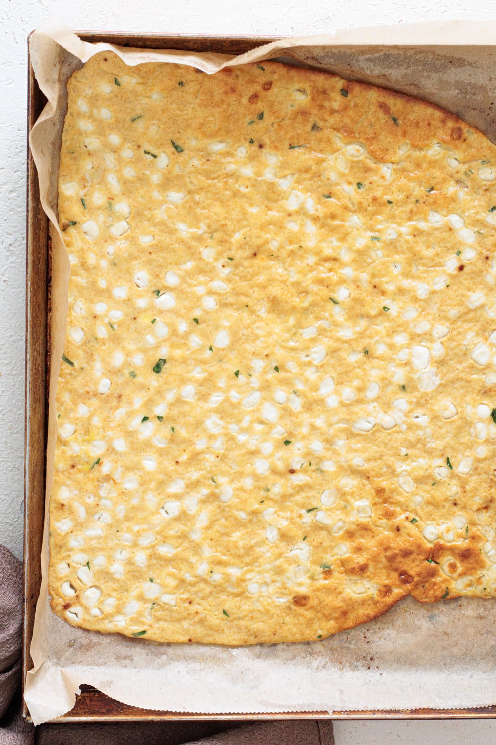 Take it out of the oven, let it sit for a minute, and then add the toppings you prefer.