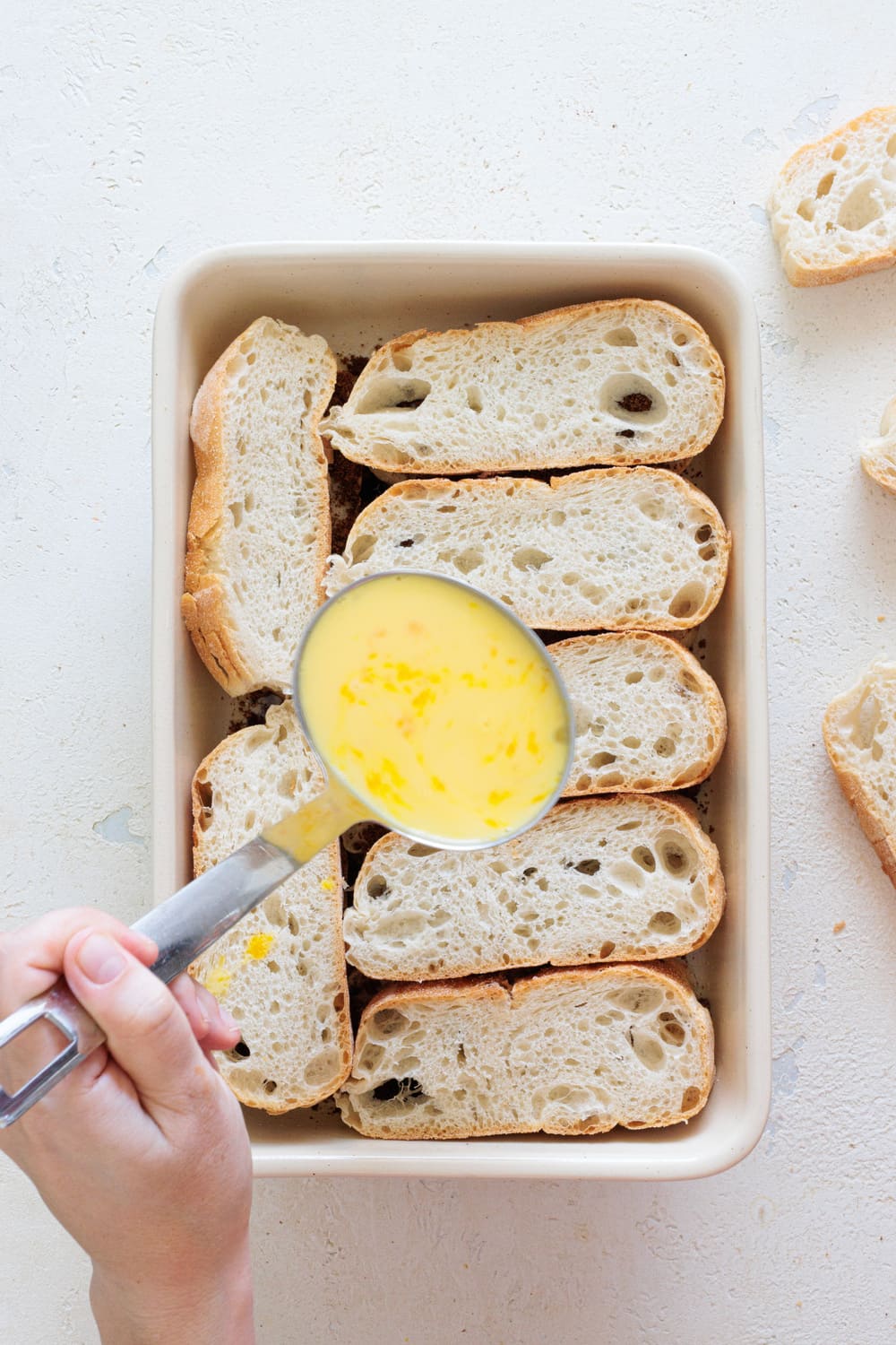 Add a second layer of bread and then the egg mixture.