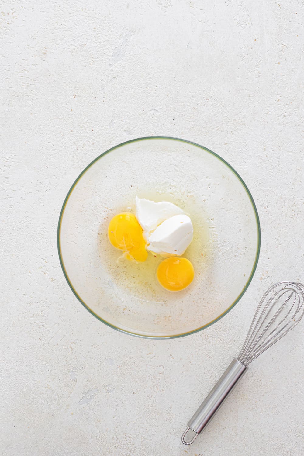 Whisk together eggs and cream cheese until smooth.