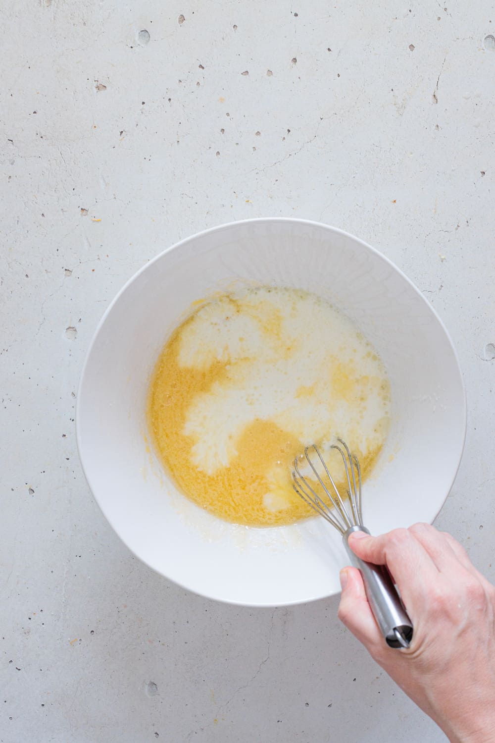 Then add the oil, milk, and orange juice.